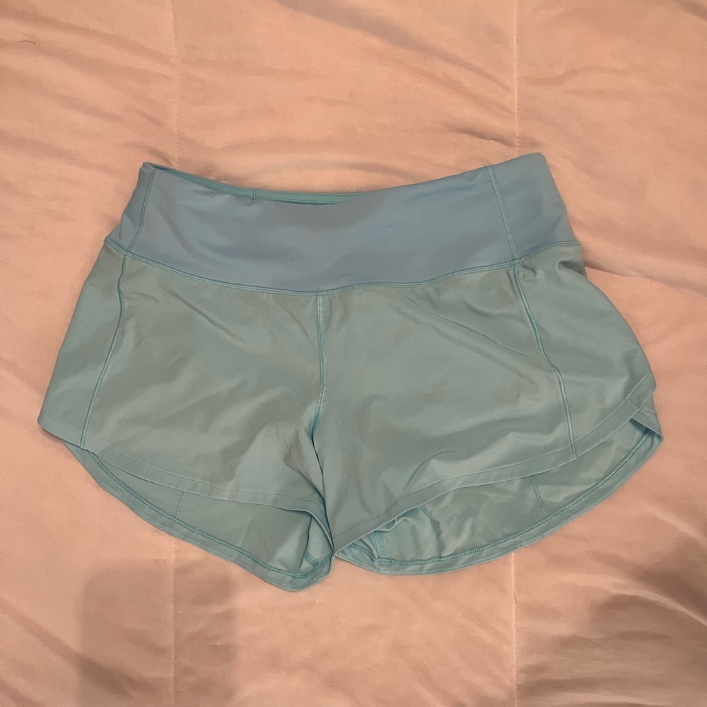 Speed up mid rise shorts 4 inch inseam size 6